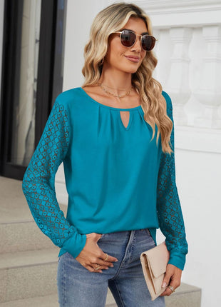 Cutout Round Neck Long Sleeve Top