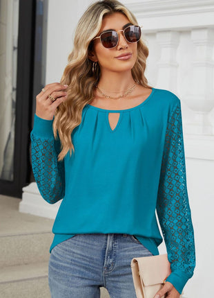 Cutout Round Neck Long Sleeve Top